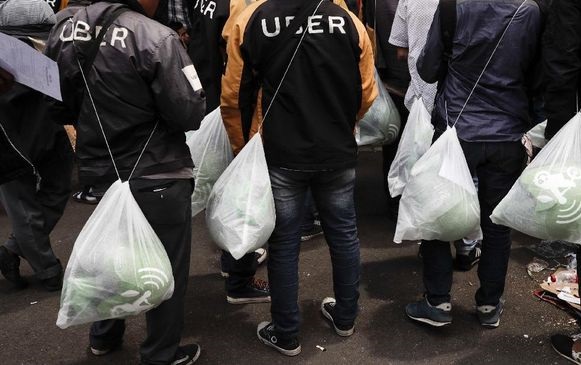 Uber PHK 400 Karyawan demi Tekan Biaya