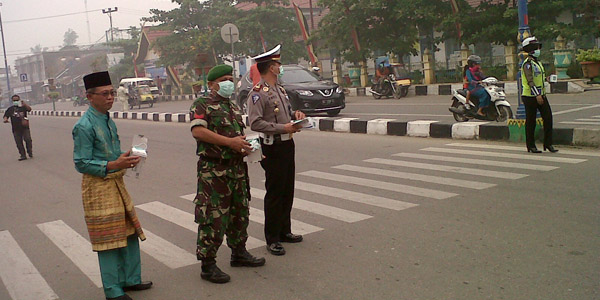 Antisipasi Dampak Kabut Asap, BPBD Rohul Bagikan 20 Ribu Masker 