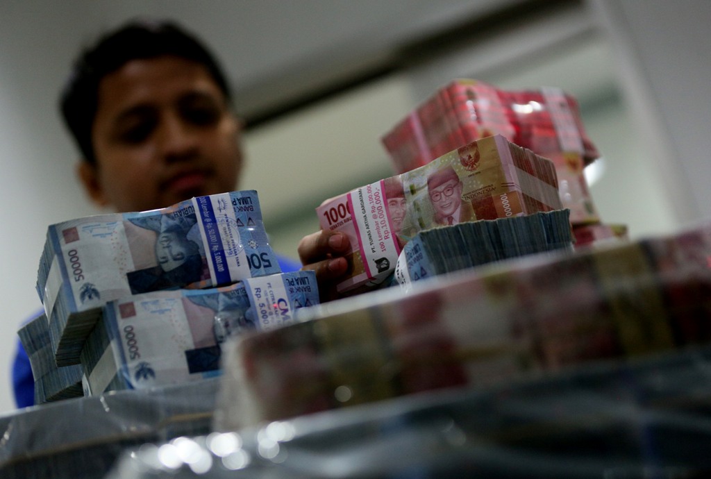 Rupiah Terkerek ke Rp14.267/USD