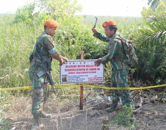 Tim Gabungan Karlahut Riau Police Line Lahan PT SRL yang Dibakar di Rohil 