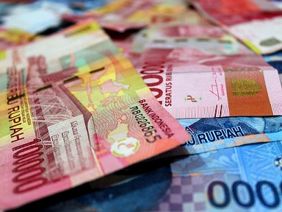 Perang Dagang AS-China Tekan Rupiah Lesu ke Rp14.125 