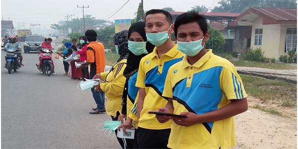 Dinkes Bagikan 500 Ribu Masker Gratis ke 21 Puskesmas se-Rohul