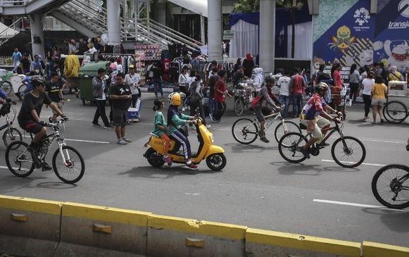 Sepeda Listrik Migo Bebas Berkeliaran di Car Free Day Jakarta 
