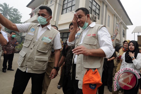 Mendikbud Pastikan Tunjangan Guru Tak Dipotong Karena Asap 