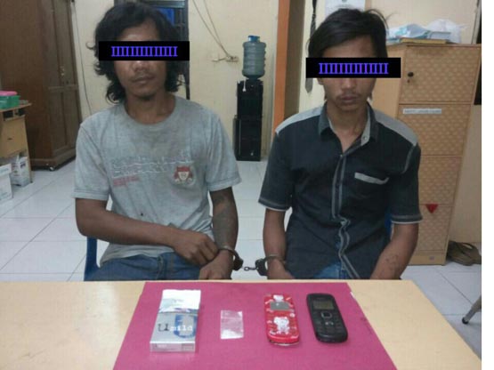Transaksi di Depan SMK di Ujungbatu, Dua Warga Rohul Ditangkap