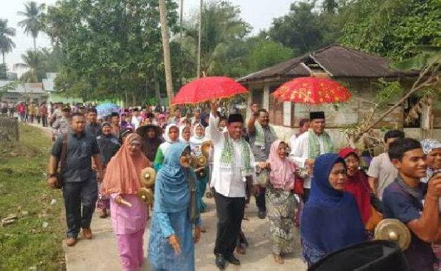 Disambut Meriah, Pasangan MM Hadiri Doa Padang di Koto Rajo 