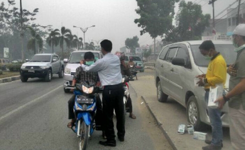 Peduli Asap di Riau, RAPP Bagikan 25 Ribu Masker di Lima Kabupaten