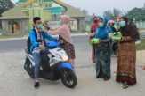 Diskes Kampar Bagikan Masker Asap