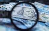 Penguatan Dolar AS Tekan Rupiah ke Level Rp13.988