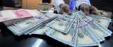 Rupiah Tembus Rp14.000/USD