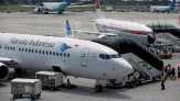 Garuda Indonesia Klarifikasi Larangan Berfoto di Pesawat
