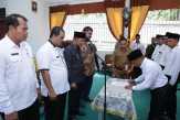Dihadiri Asisten III mewakili Bupati Rohul, Kades Rambah Samo Barat Lantik LKD Ketua RT dan RW