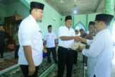 Wabup Alfedri Salurkan Zakat Rp79,5 Juta di Bungaraya