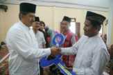 Salurkan Zakat Konsumtif di Sabak Auh, Wabup Siak Serahkan Bantuan Traktor untuk Petani