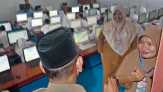 Tinjau Pelaksanan UN SMP dan UASBN SD, Bupati Pelalawan Riau Singgung Arus Listrik yang Padam