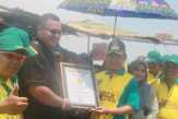3.000 Masyarakat Ramaikan Festival Menongkah di Pantai Bidari Inhil, Mandi Lumpur Raih Rekor MURI